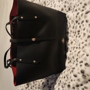 Large black and red coach handbag